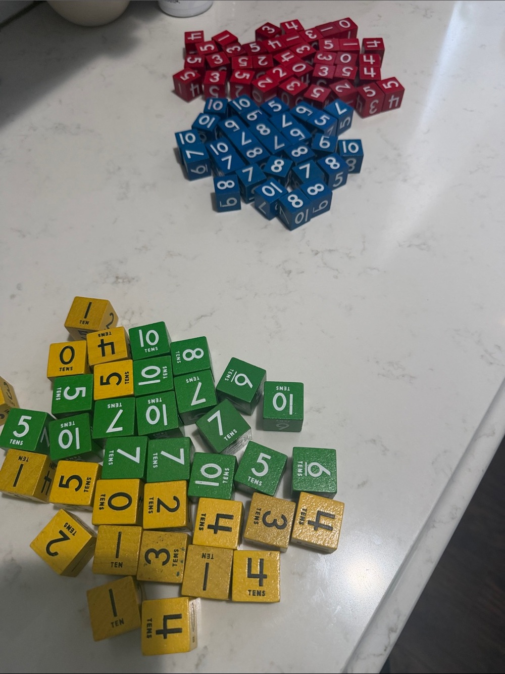 Colorful wooden dice.  1-5 6-10